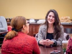 student and employer sitting at table