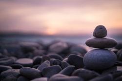 stones balancing near the water