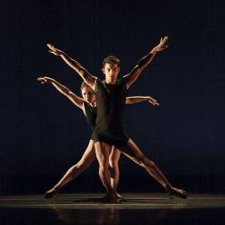 Photo of several dancers lined up to appear as one.