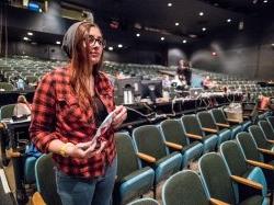 Student stage crew in auditorium seats